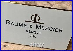 Large size brass vintage Baume & Mercier watch dealer's shop or showcase display